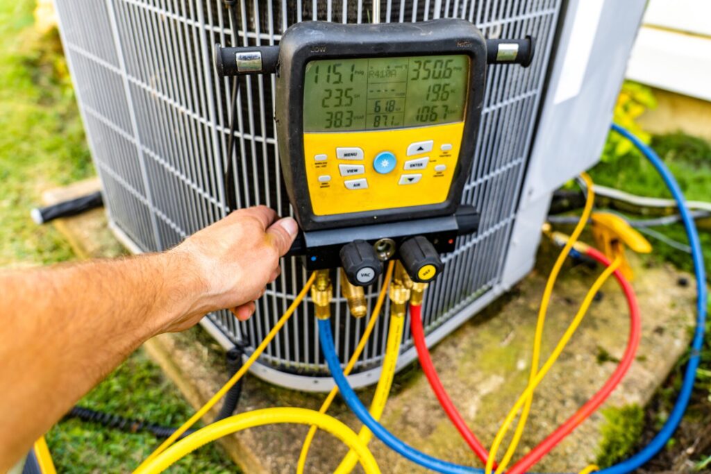Checking,The,Pressures,On,An,Hvac,System,With,Digital,Gauges.
