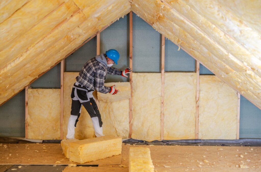 A,Worker,Wearing,A,Helmet,And,Gloves,Is,Installing,Mineral